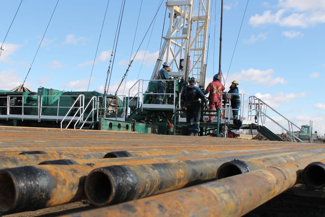 Team of workers discussing about the tower